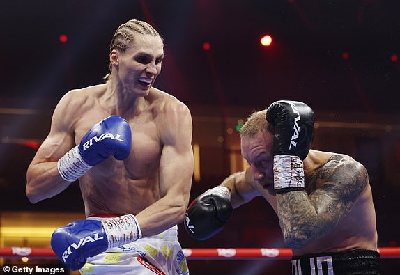 RIYADH, SAUDI ARABIA - DECEMBER 21: Daniel Lapin punches Dylan Colin during the IBF International Light Heavyweight fight between Daniel Lapin and Dylan Colin as part of Oleksandr Usyk v Tyson Fury 2, Reignited card at Kingdom Arena on December 21, 2024 in Riyadh, Saudi Arabia. (Photo by Richard Pelham/Getty Images)