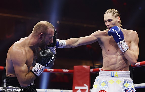 RIYADH, SAUDI ARABIA - DECEMBER 21: Daniel Lapin punches Dylan Colin during the IBF International Light Heavyweight fight between Daniel Lapin and Dylan Colin as part of Oleksandr Usyk v Tyson Fury 2, Reignited card at Kingdom Arena on December 21, 2024 in Riyadh, Saudi Arabia. (Photo by Richard Pelham/Getty Images)