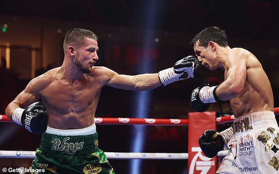 RIYADH, SAUDI ARABIA - DECEMBER 21: Rhys Edwards punches Peter McGrail during the Featherweight fight between Peter McGrail and Rhys Edwards as part of Oleksandr Usyk v Tyson Fury 2, Reignited card at Kingdom Arena on December 21, 2024 in Riyadh, Saudi Arabia. (Photo by Richard Pelham/Getty Images)