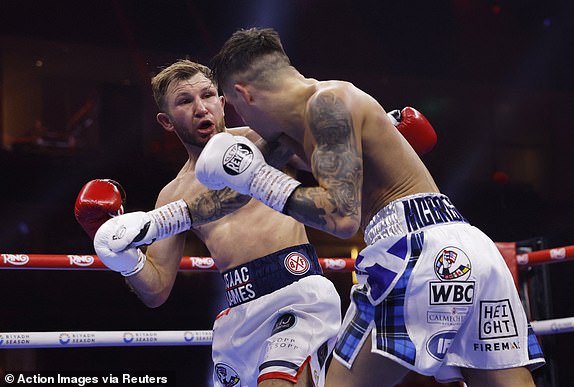 Boxing - Oleksandr Usyk v Tyson Fury - Heavyweight World Title - Kingdom Arena, Riyadh, Saudi Arabia - December 21, 2024 Isaac Lowe in action against Lee McGregor Action Images via Reuters/Andrew Couldridge