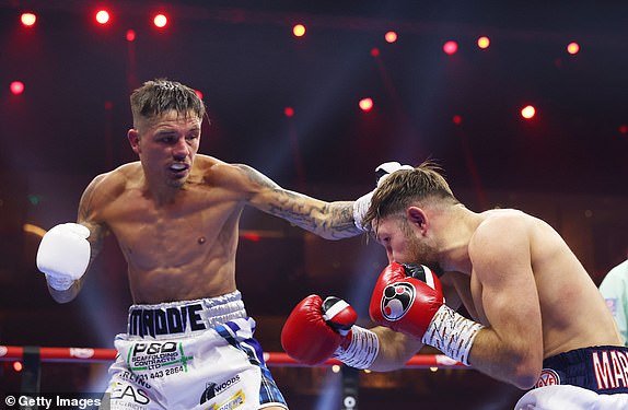 RIYADH, SAUDI ARABIA - DECEMBER 21: Lee McGregor punches Isaac Lowe during the WBC International Featherweight title fight between Isaac Lowe and Lee McGregor as part of Oleksandr Usyk v Tyson Fury 2, Reignited card at Kingdom Arena on December 21, 2024 in Riyadh, Saudi Arabia. (Photo by Richard Pelham/Getty Images)