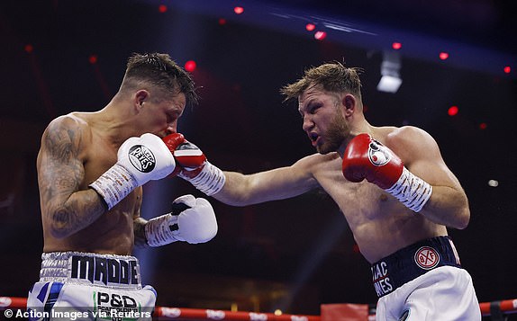 Boxing - Oleksandr Usyk v Tyson Fury - Heavyweight World Title - Kingdom Arena, Riyadh, Saudi Arabia - December 21, 2024 Isaac Lowe in action against Lee McGregor Action Images via Reuters/Andrew Couldridge