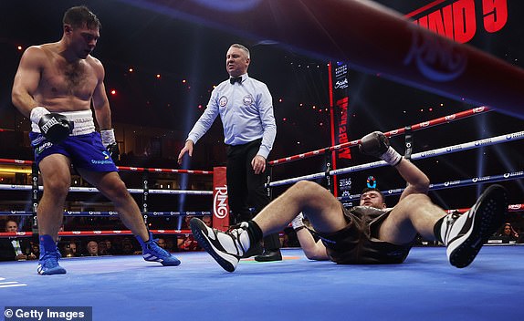 RIYADH, SAUDI ARABIA - DECEMBER 21: David Allen knocks down Johnny Fisher during the Heavyweight fight between Johnny Fisher and David Allen as part of Oleksandr Usyk v Tyson Fury 2, Reignited card at Kingdom Arena on December 21, 2024 in Riyadh, Saudi Arabia. (Photo by Richard Pelham/Getty Images)