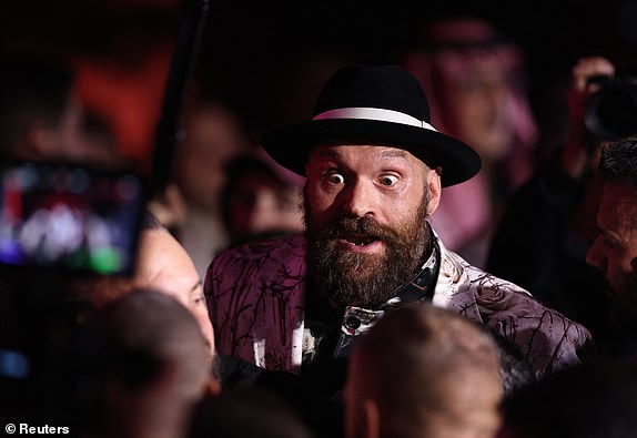 Boxing - Heavyweight World Title Fight - Oleksandr Usyk v Tyson Fury - Press Conference - VIA Riyadh, Riyadh, Saudi Arabia - December 19, 2024 Tyson Fury reacts during the press conference REUTERS/Hamad I Mohammed