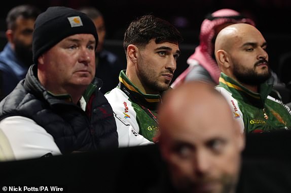 Tommy Fury watching the contest between Lee McGregor and Isaac Lowe at the Kingdom Arena in Riyadh, Saudi Arabia. Picture date: Saturday December 21, 2024. PA Photo. See PA story BOXING Fury. Photo credit should read: Nick Potts/PA Wire.RESTRICTIONS: Use subject to restrictions. Editorial use only, no commercial use without prior consent from rights holder.