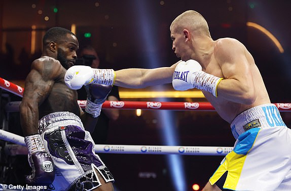 RIYADH, SAUDI ARABIA - DECEMBER 21: Serhii Bohachuk punches Ishmael Davis during the Super Welterweight fight between Serhii Bohachuk and Ishmael Davis as part of Oleksandr Usyk v Tyson Fury 2, Reignited card at Kingdom Arena on December 21, 2024 in Riyadh, Saudi Arabia. (Photo by Richard Pelham/Getty Images)