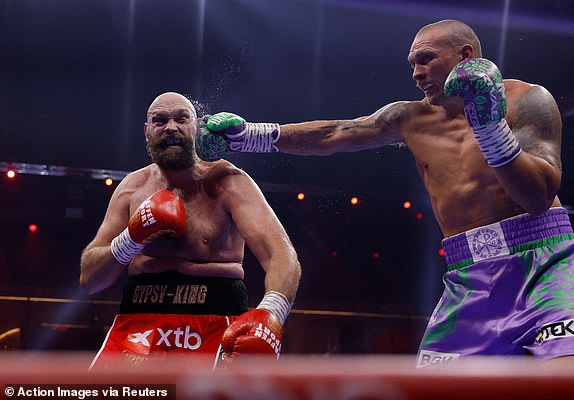 Boxing - Oleksandr Usyk v Tyson Fury - Heavyweight World Title - Kingdom Arena, Riyadh, Saudi Arabia - December 22, 2024 Tyson Fury in action against Oleksandr Usyk Action Images via Reuters/Andrew Couldridge     TPX IMAGES OF THE DAY