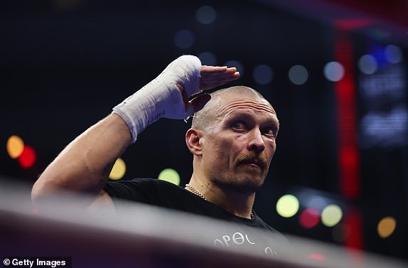 RIYADH, SAUDI ARABIA - DECEMBER 21: Oleksandr Usyk reacts following victory in the IBF, IBO, WBA, WBC and WBO Undisputed World Heavyweight titles' fight between Oleksandr Usyk and Tyson Fury as part of Oleksandr Usyk v Tyson Fury 2, Reignited card at Kingdom Arena on December 21, 2024 in Riyadh, Saudi Arabia. (Photo by Richard Pelham/Getty Images)