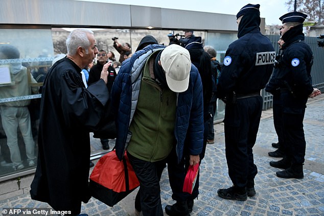 One of the defendants arrives at the courthouse in Avignon ahead of the verdicts being delivered in the Mazan rape trial