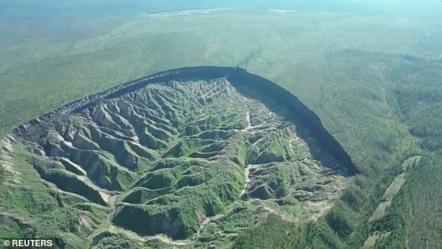 Yana was preserved in the permafrost in the Batagai megaslump (pictured in June 2023) - a rapidly expanding thermokarst depression in the Yakutia region of Russia. The tadpole-shaped giant hole is 330ft deep and around 3,300ft in length, with a width of 2,650ft