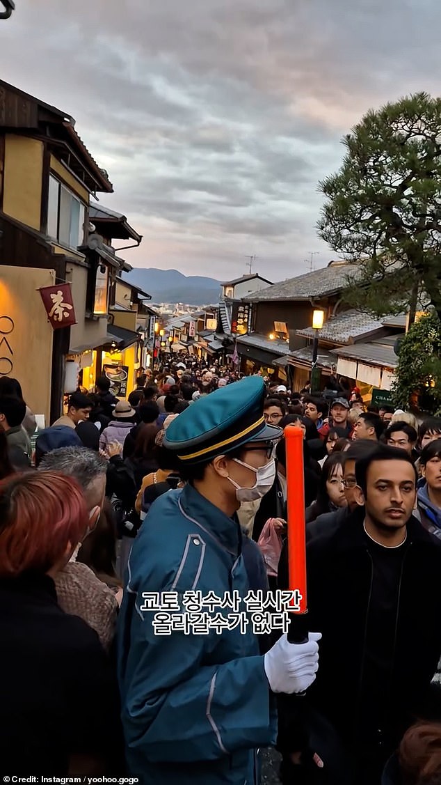 Authorities were even forced to direct the traffic on the narrow 400-metre long cobblestone street with one travel blogger describing Kyoto as the 'seventh ring of hell now'