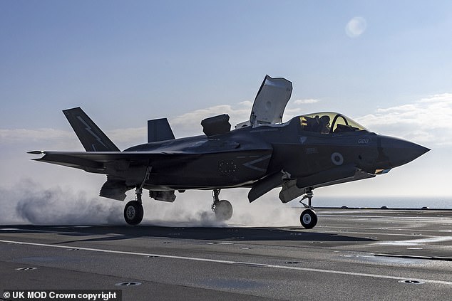 Pictued: An F-35B lands onboard HMS Queen Elizabeth