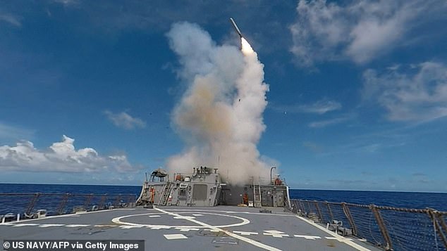 A Tomahawk Missile being launched from the Arleigh Burke-class guided-missile destroyer USS Stethem during a training exercise