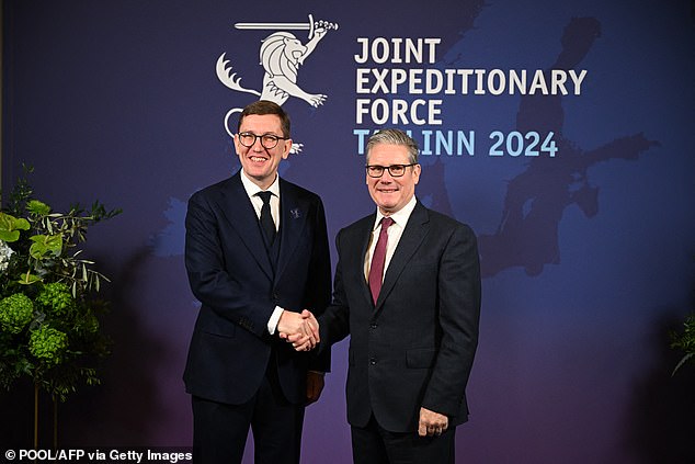 Estonia's Prime Minister Kristen Michal (L) and British Prime Minister Keir Starmer shake hands on December 17, 2024 in Tallinn, Estonia