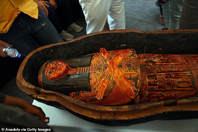 Above, a close-up of one of the New Kingdom mummies discovered in Tuna el Gebel district of Minya, Egypt last year, on October 15, 2023