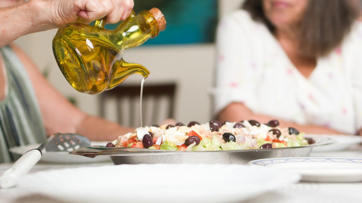 Olive oil pouring