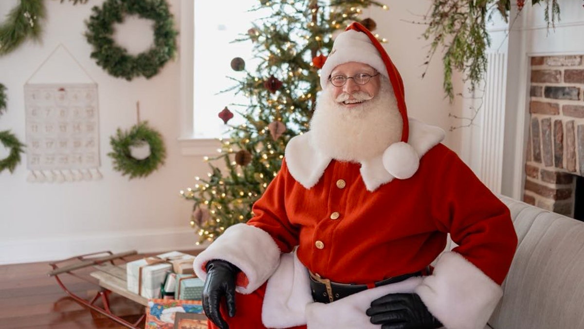 Firefighter dressing up as Santa