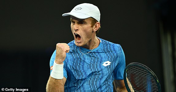 MELBOURNE, AUSTRALIA - JANUARY 16: Tristan Schoolkate of Australia celebrates a point against Jannik Sinner of Italy in the Men's Singles Second Round match during day five of the 2025 Australian Open at Melbourne Park on January 16, 2025 in Melbourne, Australia. (Photo by Hannah Peters/Getty Images)