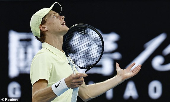 Tennis - Australian Open - Melbourne Park, Melbourne, Australia - January 16, 2025 Italy's Jannik Sinner reacts during his second round match against Australia's Tristan Schoolkate REUTERS/Tingshu Wang