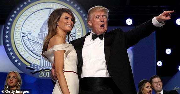 WASHINGTON, DC - JANUARY 20:  U.S. President Donald Trump and first lady Melania Trump thank guests during the inaugural Freedom Ball at the Washington Convention Center January 20, 2017 in Washington, DC. The ball is part of the celebrations following the inauguration of Pence and U.S. President Donald J. Trump.  (Photo by Chip Somodevilla/Getty Images)