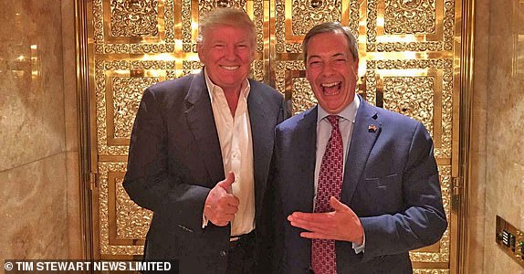 TIM STEWART NEWS LIMITED 07932745508: Nigel Farage poses with US President Elect Donald Trump in front of a bling gold-and-diamond door at New York's Trump Tower in November 2016..  ***Pix supplied as a technical service by Tim Stewart News Limited. No copyright inferred or implied***