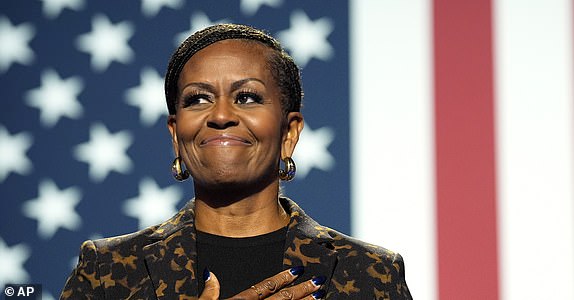 FILE - Former first lady Michelle Obama speaks at a campaign rally for democratic presidential nominee Vice President Kamala Harris at the Wings Event Center, in Kalamazoo, Mich., Oct. 26, 2024. (AP Photo/Jacquelyn Martin, File)