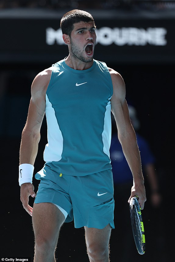 MELBOURNE, AUSTRALIA - JANUARY 19: Carlos Alcaraz of Spain celebrates a point against Jack Draper of Great Britain in the Men's Singles Fourth Round match during day eight of the 2025 Australian Open at Melbourne Park on January 19, 2025 in Melbourne, Australia. (Photo by Cameron Spencer/Getty Images)