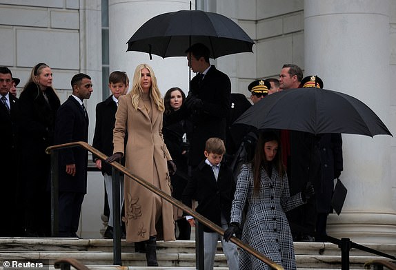 Ivanka Trump and her husband Jared Kushner wait for the arrival of U.S. President-elect Donald Trump to attend a wreath laying ceremony at Arlington National Cemetery ahead of the presidential inauguration in Arlington, Virginia, U.S. January 19, 2025.  REUTERS/Carlos Barria