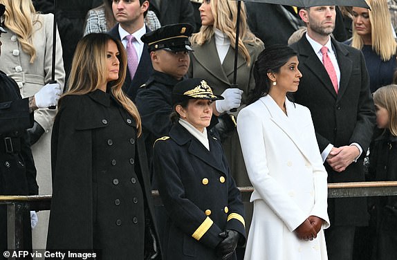 US former First Lady Melania Trump (L) and Usha Vance (R) arrive to attend a wreath laying by US President-elect Donald Trump and Vice President-elect J.D. Vance at the Tomb of the Unknown Soldier at Arlington National Cemetery in Arlington, Virginia, on January 19, 2025. (Photo by Jim WATSON / AFP) (Photo by JIM WATSON/AFP via Getty Images)