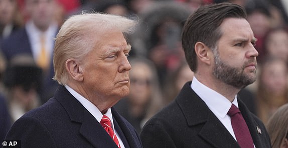 President-elect Donald Trump and Vice President-elect JD Vance arrive for a wreath laying ceremony at Arlington National Cemetery, Sunday, Jan. 19, 2025, in Arlington, Va. (AP Photo/Evan Vucci)