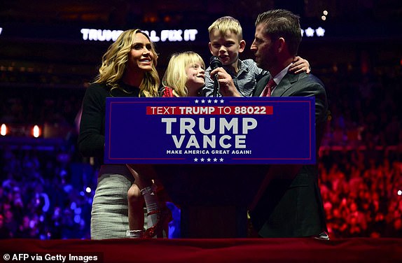 Eric Trump, his wife Lara Trump and their children appear on stage during US President-elect Donald Trump and US Vice President-elect J.D. Vance's MAGA victory rally at Capital One Arena in Washington, DC on January 19, 2025, one day ahead of their inauguration ceremony. (Photo by Jim WATSON / AFP) (Photo by JIM WATSON/AFP via Getty Images)