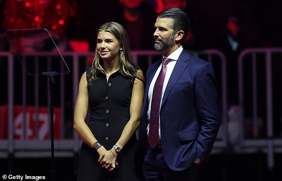 WASHINGTON, DC - JANUARY 19: Donald Trump Jr. and his daughter Kai Madison Trump stand ton stage at President-elect Donald Trump's victory rally at the Capital One Arena on January 19, 2025 in Washington, DC.  Trump will be sworn in as the 47th U.S. president on January 20. (Photo by Scott Olson/Getty Images)