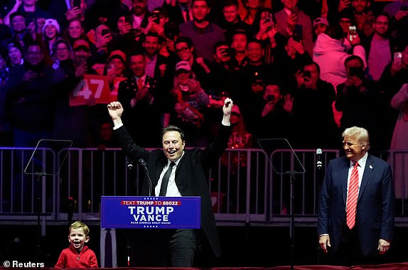 Tesla CEO and X owner Elon Musk gestures during a rally with U.S. President-elect Donald Trump the day before Trump is scheduled to be inaugurated for a second term, in Washington, U.S., January 19, 2025. REUTERS/Elizabeth Frantz