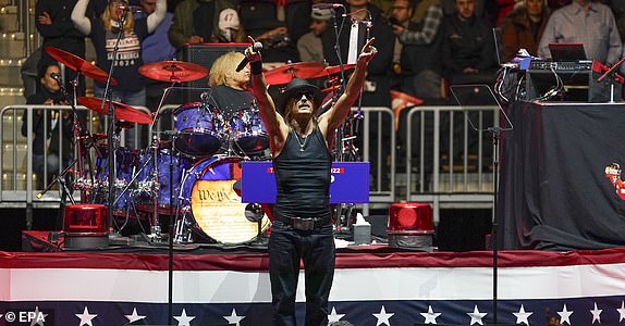 epa11837486 Kid Rock performs at the start of a rally with President-elect Donald Trump at Capital One Arena in Washington, DC, USA, 19 January 2025. President-elect Donald Trump, who defeated Joe Biden to become the 47th president of the United States, will be inaugurated on 20 January, though all of the planned outdoor ceremonies and events have been cancelled due to a forecast of extreme cold temperatures.  EPA/WILL OLIVER