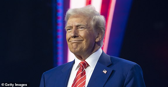 PHOENIX, ARIZONA - DECEMBER 22: U.S. President-elect Donald Trump smiles during Turning Point USA's AmericaFest at the Phoenix Convention Center on December 22, 2024 in Phoenix, Arizona. The annual four day conference geared toward energizing and connecting conservative youth hosts some of the country's leading conservative politicians and activists. (Photo by Rebecca Noble/Getty Images)