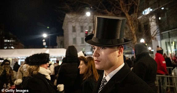 WASHINGTON, DC - JANUARY 20: Alek Drexler, from Illinois, waits on line to get into Capital One Arena for Donald Trump's inauguration celebration on January 20, 2025 in Washington, DC. U.S. President-elect Donald Trump and Vice President-elect JD Vance will be sworn in on January 20 in an indoor ceremony in the rotunda of the U.S. Capitol with a celebration at the Arena after. (Photo by Stephanie Keith/Getty Images)