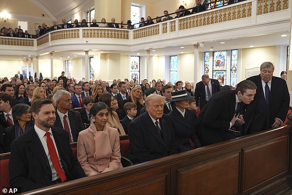 President-elect Donald Trump, Melania Trump and Barron Trump, Victor Knavs arrive for a service at St. John's Church, Monday, Jan. 20, 2025, in Washington, ahead of the 60th Presidential Inauguration. At left are Vice President-elect JD Vance and Usha Vance.(AP Photo/Evan Vucci)