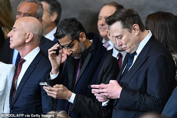 (L-R) Amazon founder Jeff Bezos, Google CEO Sundar Pichai and Tesla and SpaceX CEO Elon Musk attend the inauguration ceremony before Donald Trump is sworn in as the 47th US President in the US Capitol Rotunda in Washington, DC, on January 20, 2025. (Photo by SAUL LOEB / POOL / AFP) (Photo by SAUL LOEB/POOL/AFP via Getty Images)