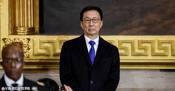 Han Zheng (C), Vice President of the People's Republic of China, attends Donald Trump's inauguration as the next President of the United States at the United States Capitol in Washington, DC, USA, 20 January 2025. Trump, who defeated Kamala Harris, is being sworn in today as the 47th president of the United States, though the planned outdoor ceremonies and events have been cancelled due to a forecast of extreme cold temperatures.    SHAWN THEW/POOL/Pool via REUTERS