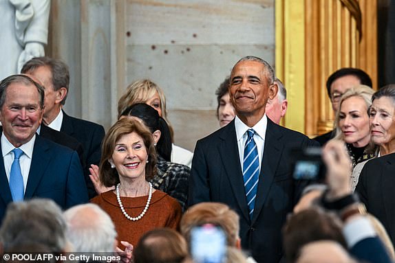 (L-R) Former President George W. Bush, Former First Lady Laura Bush and Former President Barack Obama arrive for the inauguration ceremony where Donald Trump will sworn in as the 47th US President in the US Capitol Rotunda in Washington, DC, on January 20, 2025. (Photo by Kenny HOLSTON / POOL / AFP) (Photo by KENNY HOLSTON/POOL/AFP via Getty Images)