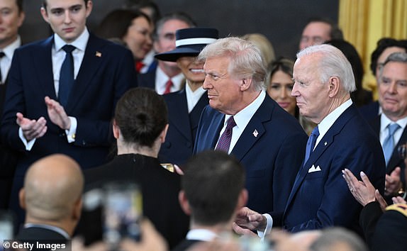 WASHINGTON, DC - JANUARY 20: US President Joe Biden (R) looks on as President-elect Donald Trump arrives for his inauguration in the U.S. Capitol Rotunda on January 20, 2025 in Washington, DC. Donald Trump takes office for his second term as the 47th President of the United States. (Photo by Saul Loeb-Pool/Getty Images)