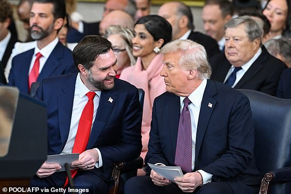 (L-R) US Vice President-elect J.D. Vance speaks with President-elect Donald Trump during the inauguration ceremony before Trump is sworn in as the 47th US President and Vance is sworn in as the 50th Vice President in the US Capitol Rotunda in Washington, DC, on January 20, 2025. (Photo by SAUL LOEB / POOL / AFP) (Photo by SAUL LOEB/POOL/AFP via Getty Images)