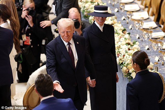 WASHINGTON, DC - JANUARY 20: U.S. President Donald Trump and first lady Melania Trump greet guests during the luncheon following inauguration   at the U.S. Capitol  on January 20, 2025 in Washington, DC. Donald Trump takes office for his second term as the 47th president of the United States. (Photo by Kevin Dietsch/Getty Images)