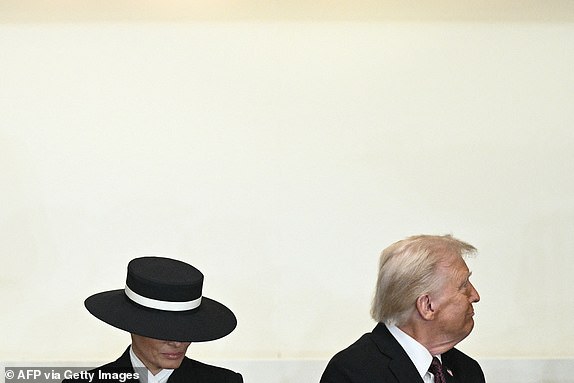 US President Donald Trump and First Lady Melania Trump attend a luncheon following the inauguration ceremony, in Statuary Hall at the US Capitol in Washington, DC, on January 20, 2025. (Photo by Brendan SMIALOWSKI / AFP) (Photo by BRENDAN SMIALOWSKI/AFP via Getty Images)