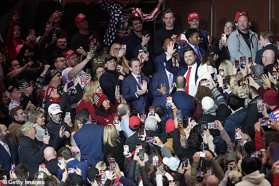 WASHINGTON, DC - JANUARY 20: U.S. Vice President J.D. Vance (C-R) arrives with his family during an indoor inauguration parade at Capital One Arena on January 20, 2025 in Washington, DC. Donald Trump takes office for his second term as the 47th president of the United States. (Photo by Christopher Furlong/Getty Images)