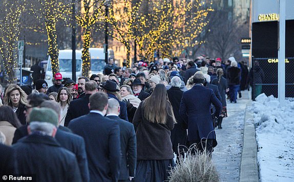 People queue to enter Liberty Inauguration ball, on inauguration day of Donald Trump's second presidential term, in Washington, U.S. January 20, 2025. REUTERS/Jeenah Moon