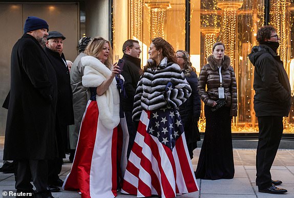 People queue to enter Liberty Inauguration ball, on inauguration day of Donald Trump's second presidential term, in Washington, U.S. January 20, 2025. REUTERS/Jeenah Moon