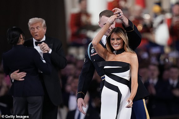 WASHINGTON, DC - JANUARY 20: Melania Trump and President Donald Trump dance at the Commander-in-Chief Ball on January 20, 2025 in Washington, DC.  President Trump attends some of the inaugural balls after taking the oath as the 47th president. (Photo by Andrew Harnik/Getty Images)