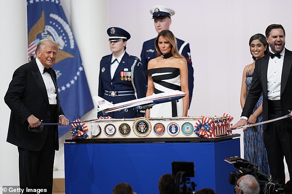 WASHINGTON, DC - JANUARY 20: President Donald Trump and Vice President JD Vance cut a cake at the Commander and Chief Ball while First Lady Melania Trump and 2nd Lady Usha Vance look on January 20, 2025 in Washington, DC.  President Trump attends some of the inaugural balls after taking the oath as the 47th president. (Photo by Andrew Harnik/Getty Images)