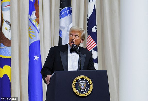 U.S. President Donald Trump attends the Commander in Chief Ball in honor of his inauguration in Washington, U.S., January 20, 2025. REUTERS/Daniel Cole